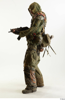 Photos John Hopkins Army Postapocalyptic Suit Poses aiming the gun…